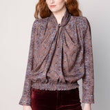 Blusa Maine de la marca O-2025-600, blusa de manga larga en color blanco con detalles elegantes.