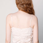 Blusa tipo top Anise Arena Ress en color blanco, con diseño sin mangas y detalle en la parte superior, de la marca O-2025-621.