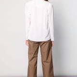 Blusa Kunai de la marca O-2025-611, con diseño moderno y detalles en la parte superior, ideal para un estilo casual y cómodo.