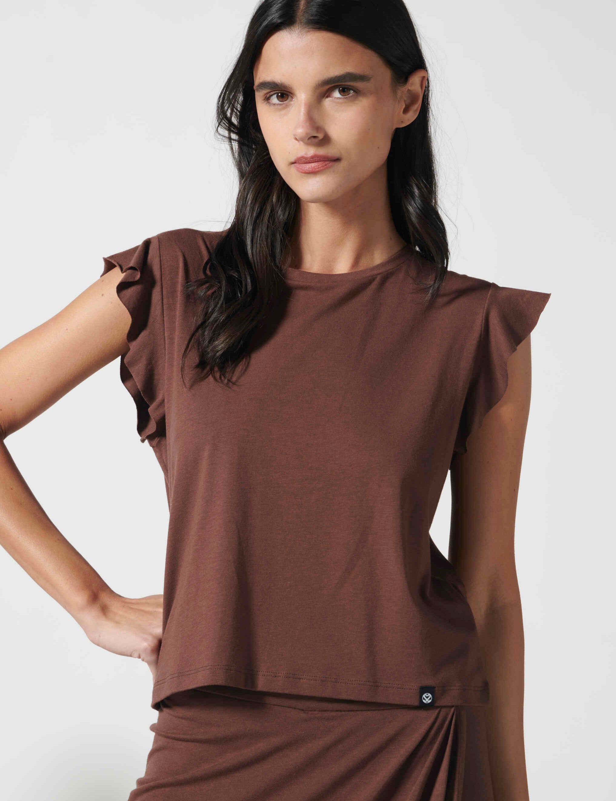 Polera negra EV-2026-500 de la marca Lofty, blusa de manga larga y corte ajustado, vista frontal.