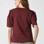 Polera Audrey Granada de la marca EV-2026-502, blusa de manga larga en color gris con cuello redondo y detalles suaves.