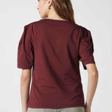 Polera Audrey Granada de la marca EV-2026-502, blusa de manga larga en color gris con cuello redondo y detalles suaves.