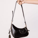Mini bolso Stella negro de la marca AI-2025-201, accesorios pequeños con asa y diseño compacto en la imagen.
