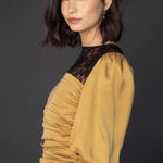 Blusa Finel de la marca O-2025-613, muestra en color y detalles de tela, ideal para un estilo casual y elegante.