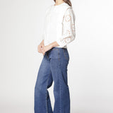 Jeans Stella Stretch de la marca D-2024-804, pantalones vaqueros ajustados de mezclilla azul con bolsillos delanteros y cinturilla.