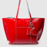 Bolso shopper Charo en rojo de la marca AI-2025-100, con asas de cuerda y diseño espacioso para accesorios y compras.