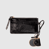 Billetera Isabelle negra de la marca AI-2025-302, accesorio elegante con diseño compacto y detalles en cuero.