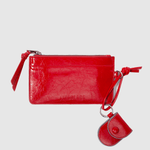 Billetera Isabelle en color rojo de la marca AI-2025-301, con diseño elegante y compartimentos para tarjetas y dinero.