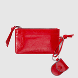 Billetera Isabelle en color rojo de la marca AI-2025-301, con diseño elegante y compartimentos para tarjetas y dinero.