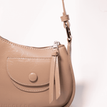Bolso mini Stella taupe de la marca AI-2025-202, accesorio elegante con asa y diseño compacto en tono gris claro.