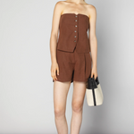 Top Onske Mulle de la marca CV-2025-650, con diseño elegante y detalles de tela en la imagen.