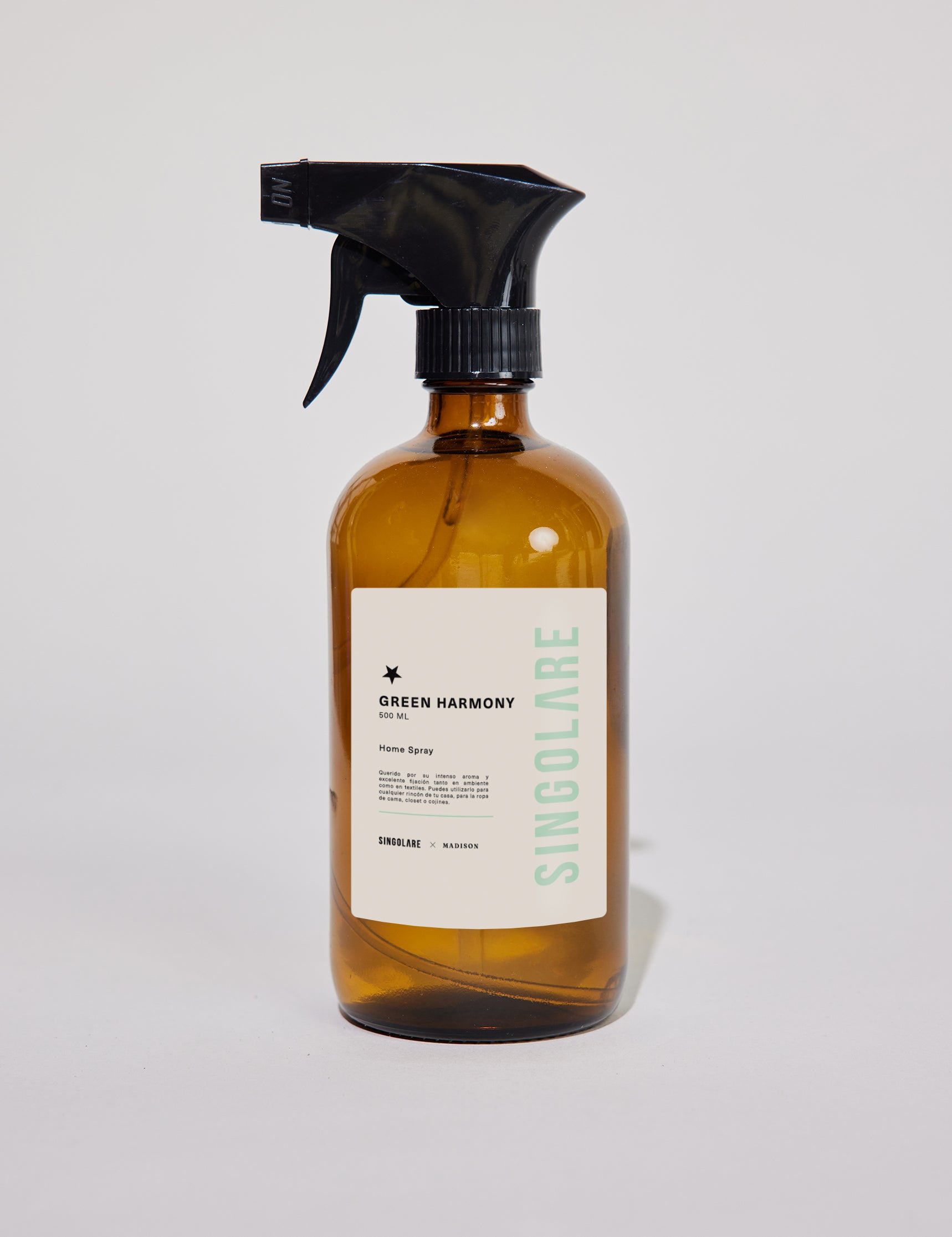 Spray ambientador para el hogar de 500 ml en botella verde, marca MS-0000-111, aroma armonía para ambientes frescos.
