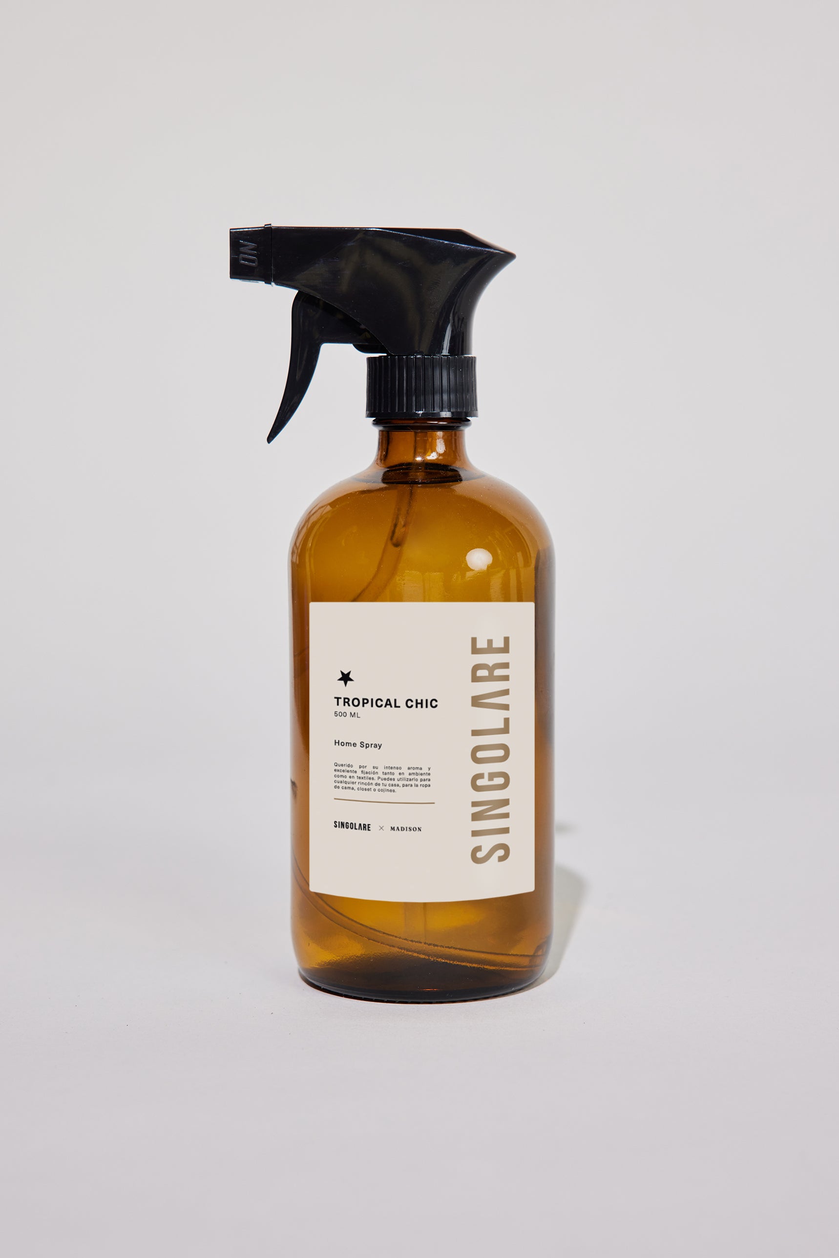 Spray ambientador tropical chic de 500ml de la marca MS-0000-111, envase con diseño elegante para uso en el hogar