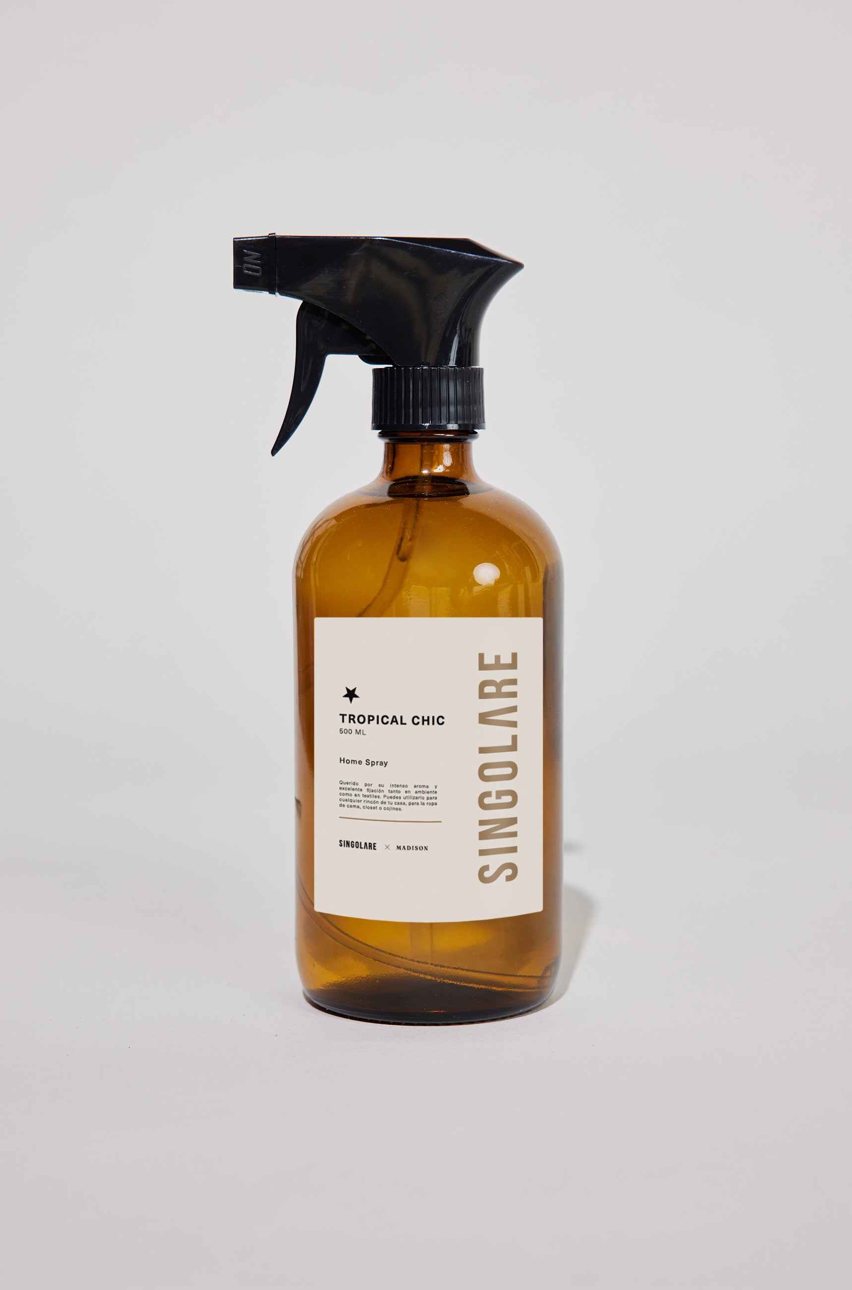 Spray ambientador tropical chic de 500ml de la marca MS-0000-111, envase con diseño elegante para uso en el hogar