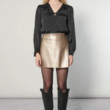 Blusa Zulmi de la marca I-2025-635, blusa de manga larga en tela suave con diseño moderno y color neutro.