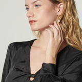 Blusa Zulmi de la marca I-2025-635, con diseño elegante y detalles en la tela, visible en la imagen.