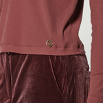 Polera Cherry de la marca I-2025-530, blusa de manga larga con diseño de cerezas en color rojo y blanco.