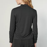 Blusa Beatle Joy de la marca EI-2025-503 en color blanco, con diseño moderno y detalles de moda, vista frontal en la imagen.