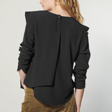 Blusa Muse de la colección I-2024-638, diseño moderno en tela ligera, con detalles elegantes y cuello redondo.