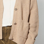 Cardigan Verona de tejidos de la marca I-2025-14, en color gris, con detalles de botones y cuello redondo.