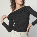 Polera Summa de la marca EI-2025-502, blusa de manga larga en color neutro, con diseño sencillo y cómodo para uso diario.