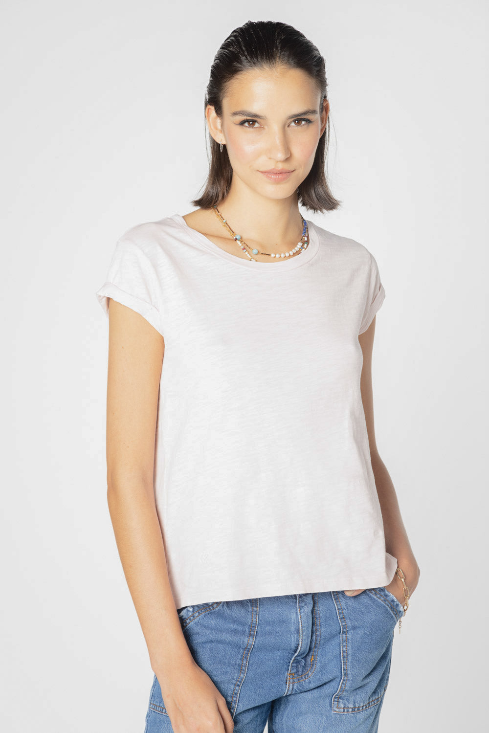 Blusa polera Francesca de la marca EV-2025-502, color gris, con cuello redondo y manga larga, vista frontal sobre fondo neutro.