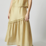 Falda Jules de la marca P-2026-409, diseño elegante en tela suave, con detalles en la cintura y caída fluida.