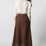 Blusa Mitchel de la marca EV-2026-610, mostrando un diseño elegante y cómodo en tela ligera de color neutro.