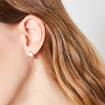 Aros Olave de plata de la marca BI-2024-230, diseño elegante y brillante, mostrando detalles y acabado en la imagen.