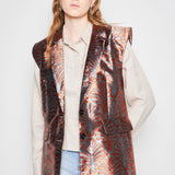 Chaqueta blazer Sialia de la marca O-2024-904, en color gris con cuello y mangas largas, vista frontal sobre fondo neutro.