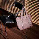 Accesorios shopper Iris burdeos de la marca AI-2025-104, bolso grande y elegante con asas resistentes y diseño moderno.