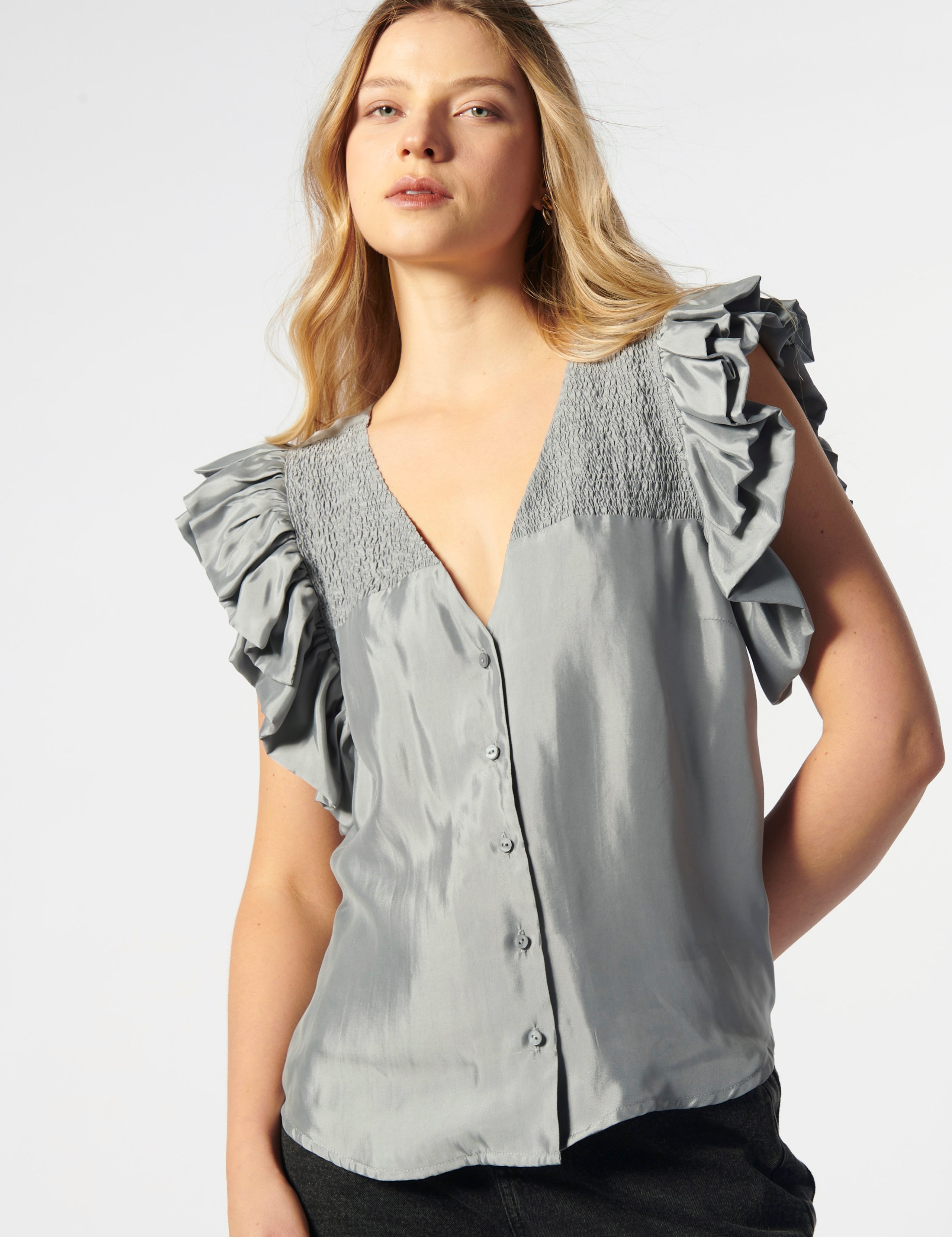 Blusa malva de la marca EV-2026-606, estilo casual con cuello redondo y manga larga, vista frontal en la imagen.
