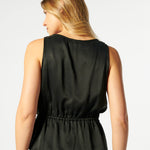 Blusa Aisse Negra de la marca P-2026-602, con diseño elegante, manga larga y cuello redondo, visible en la imagen.