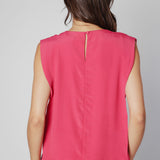 Blusa Agama de la marca V-2025-633 en color azul, con diseño de manga larga y cuello redondo, sobre fondo blanco.