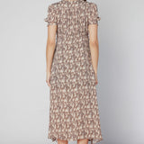 Vestido Malik de la marca O-2025-704, con diseño elegante y moderno, en color y estilo visible en la imagen.