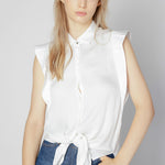 Blusa Asura de la marca O-2025-615, con diseño elegante y detalles en la parte superior, en color neutro.