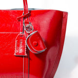 Accesorios Shopper Charo Red de la marca AI-2025-100, bolso de mano con diseño en color rojo y asas resistentes.